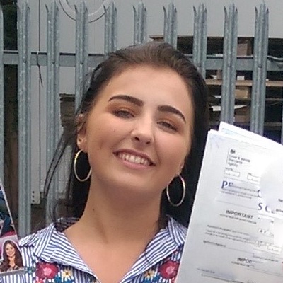 Headshot of former student Mia